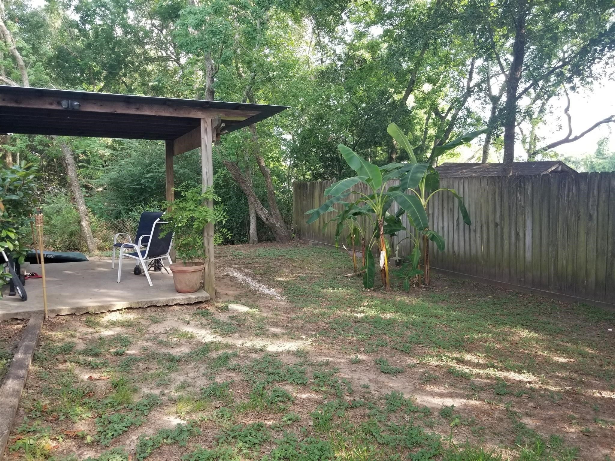 4508 15th Street Bacliff, TX 77518 - Photo 2 of 17 a backyard of a house with table and chairs