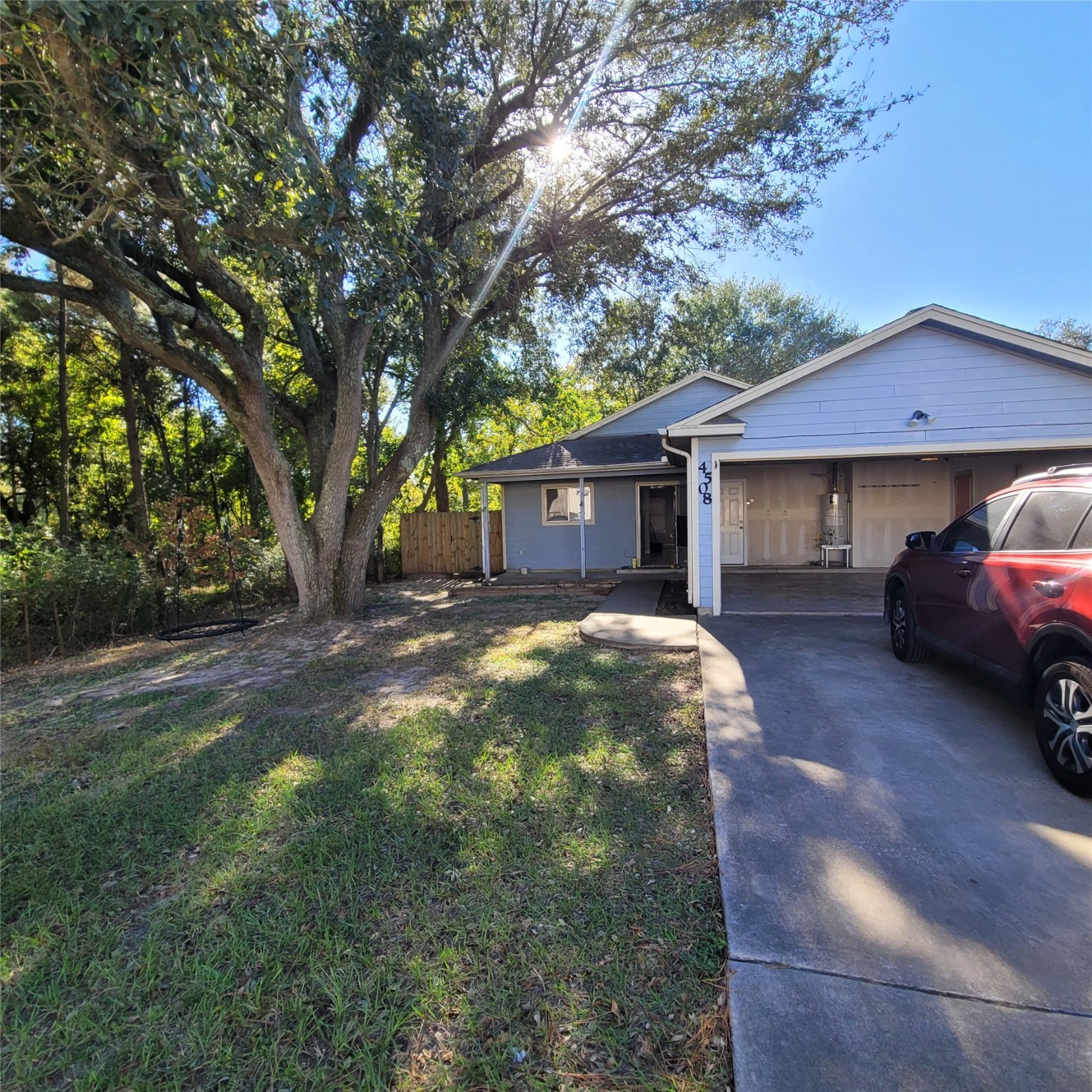 4508 15th Street Bacliff, TX 77518 - Photo 4 of 17 a view of a house with a yard