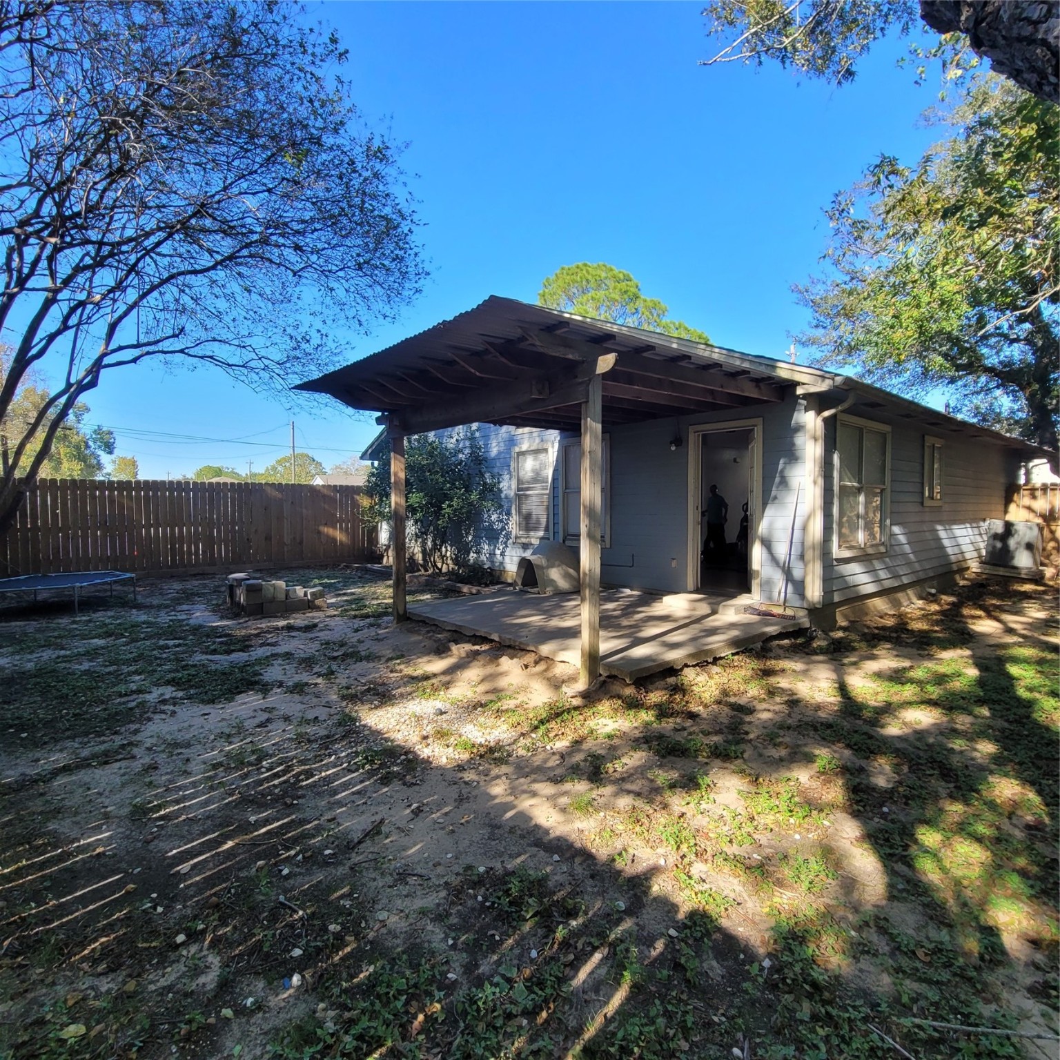 4508 15th Street Bacliff, TX 77518 - Photo 6 of 17 a backyard of a house with table and chairs