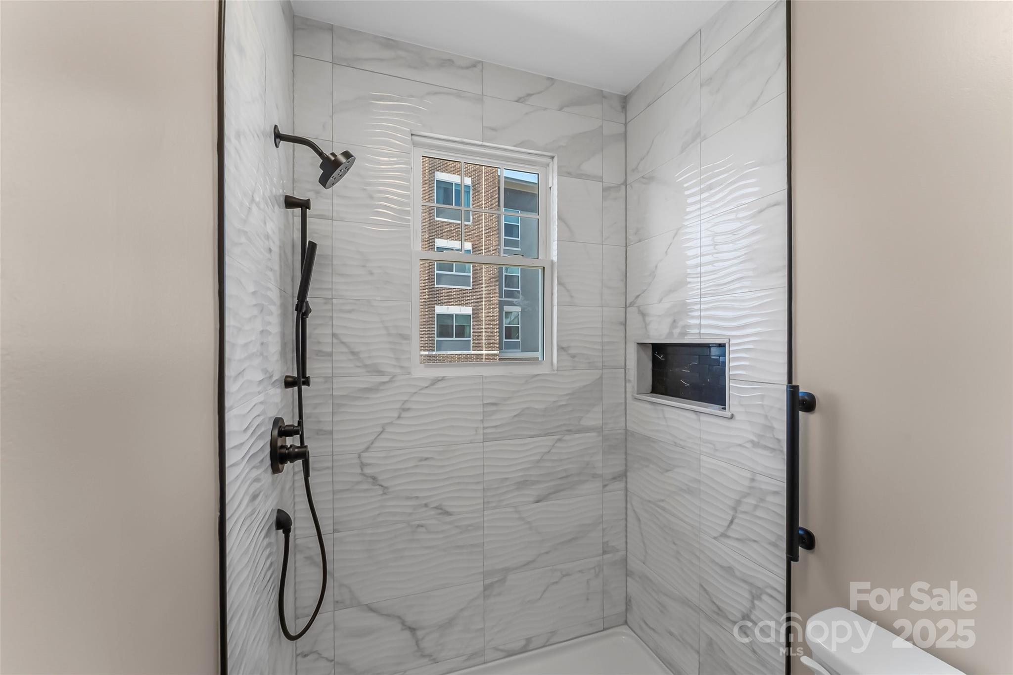 308 North Green Street, Unit 6 Morganton, NC 28655 - Photo 13 of 21 a bathroom with a shower
