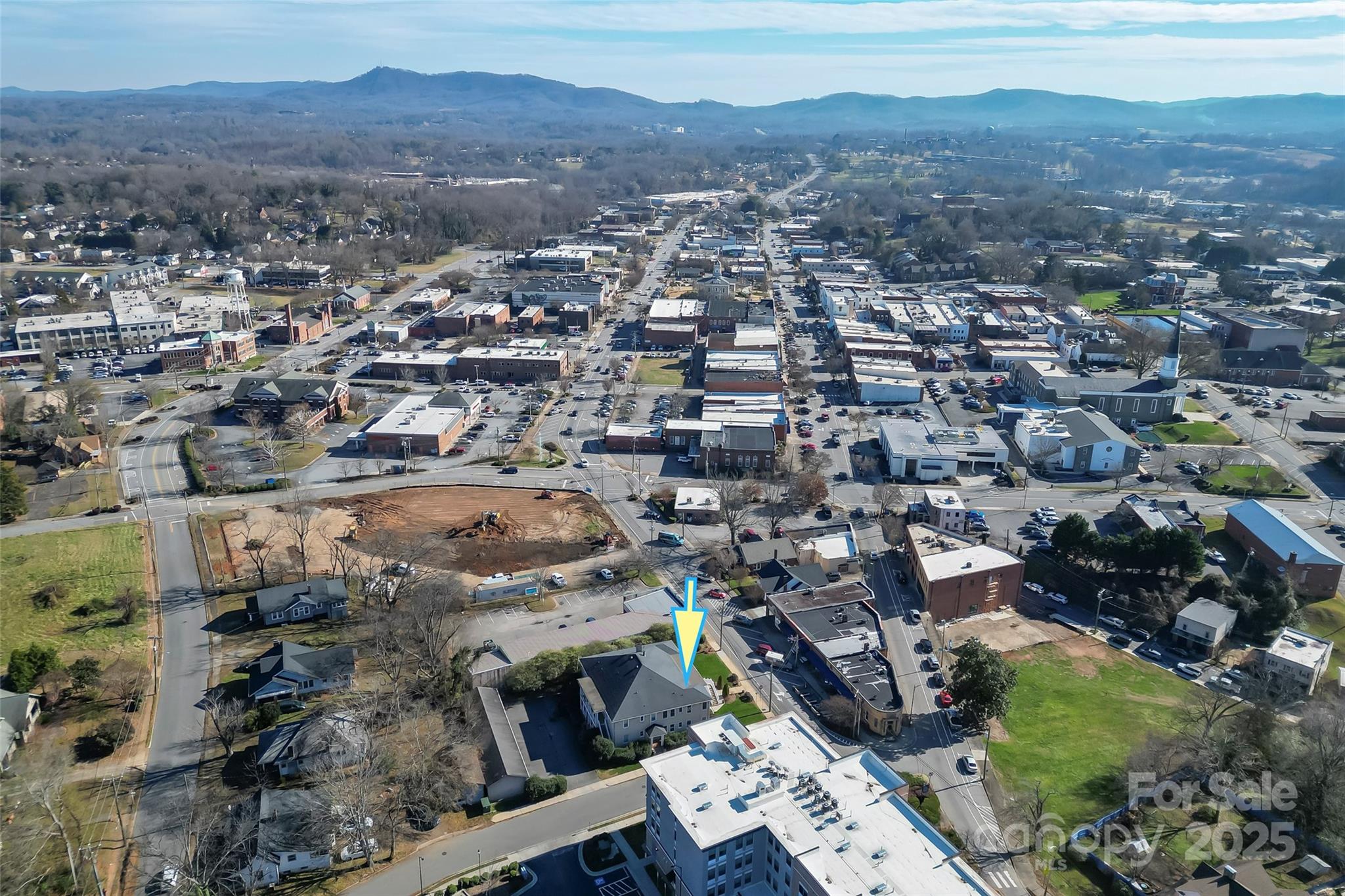 308 North Green Street, Unit 6 Morganton, NC 28655 - Photo 20 of 21 an aerial view of residential houses with outdoor space