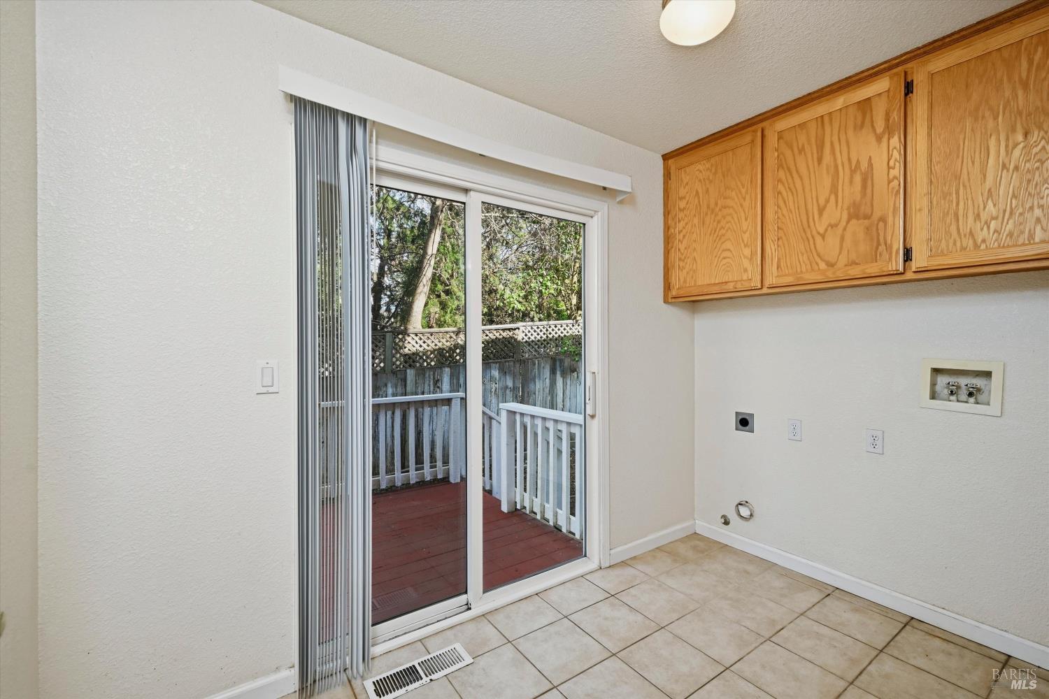 366 Breeden Street Santa Rosa, CA 95409 - Photo 25 of 39 Indoor laundry room with deck and outdoor access.