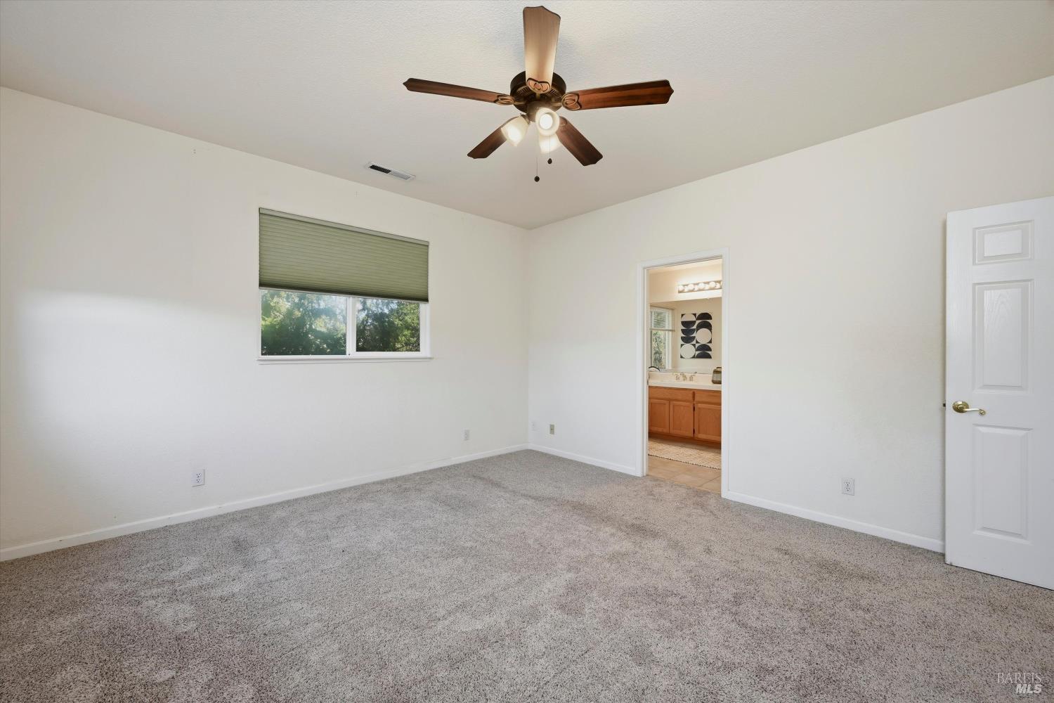 366 Breeden Street Santa Rosa, CA 95409 - Photo 26 of 39 Large primary suite with private bathroom and walk-in closet.
