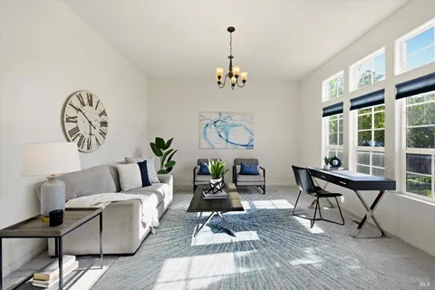 a dining room with furniture and window