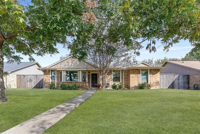 front view of house with a yard