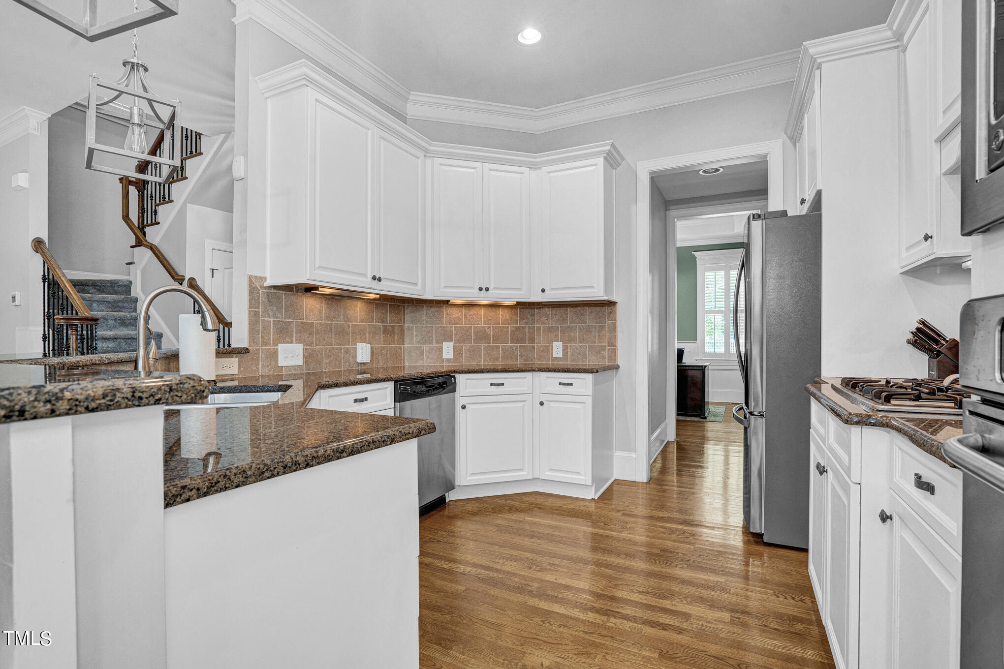 1700 Rainbow Hill Raleigh, NC 27614 - Photo 13 of 35 a kitchen with granite countertop a sink stove and refrigerator