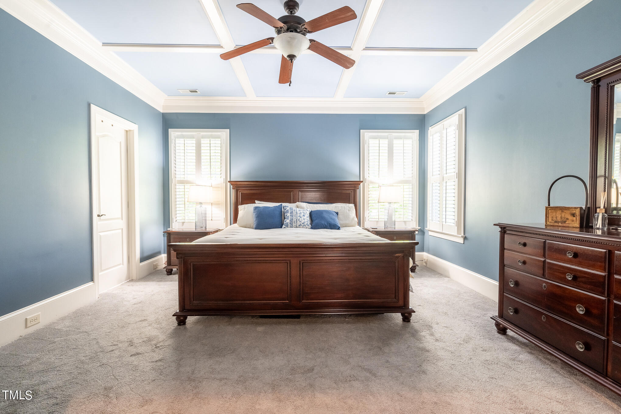 1700 Rainbow Hill Raleigh, NC 27614 - Photo 14 of 35 a bedroom with a bed and a chandelier