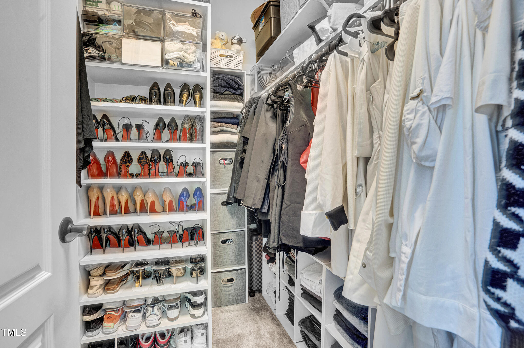 1700 Rainbow Hill Raleigh, NC 27614 - Photo 21 of 35 a view of walk in closet with clothes and shoes