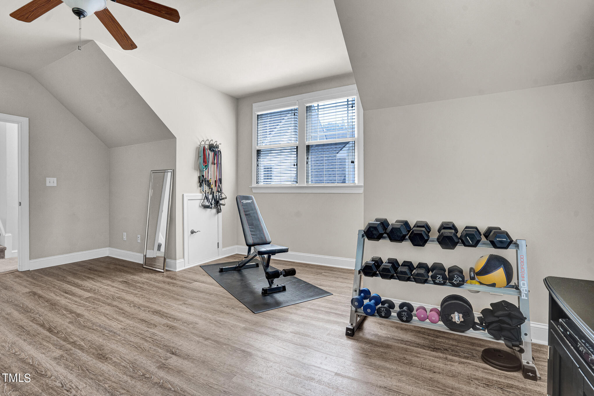 1700 Rainbow Hill Raleigh, NC 27614 - Photo 24 of 35 a view of a room with gym equipment and equipment