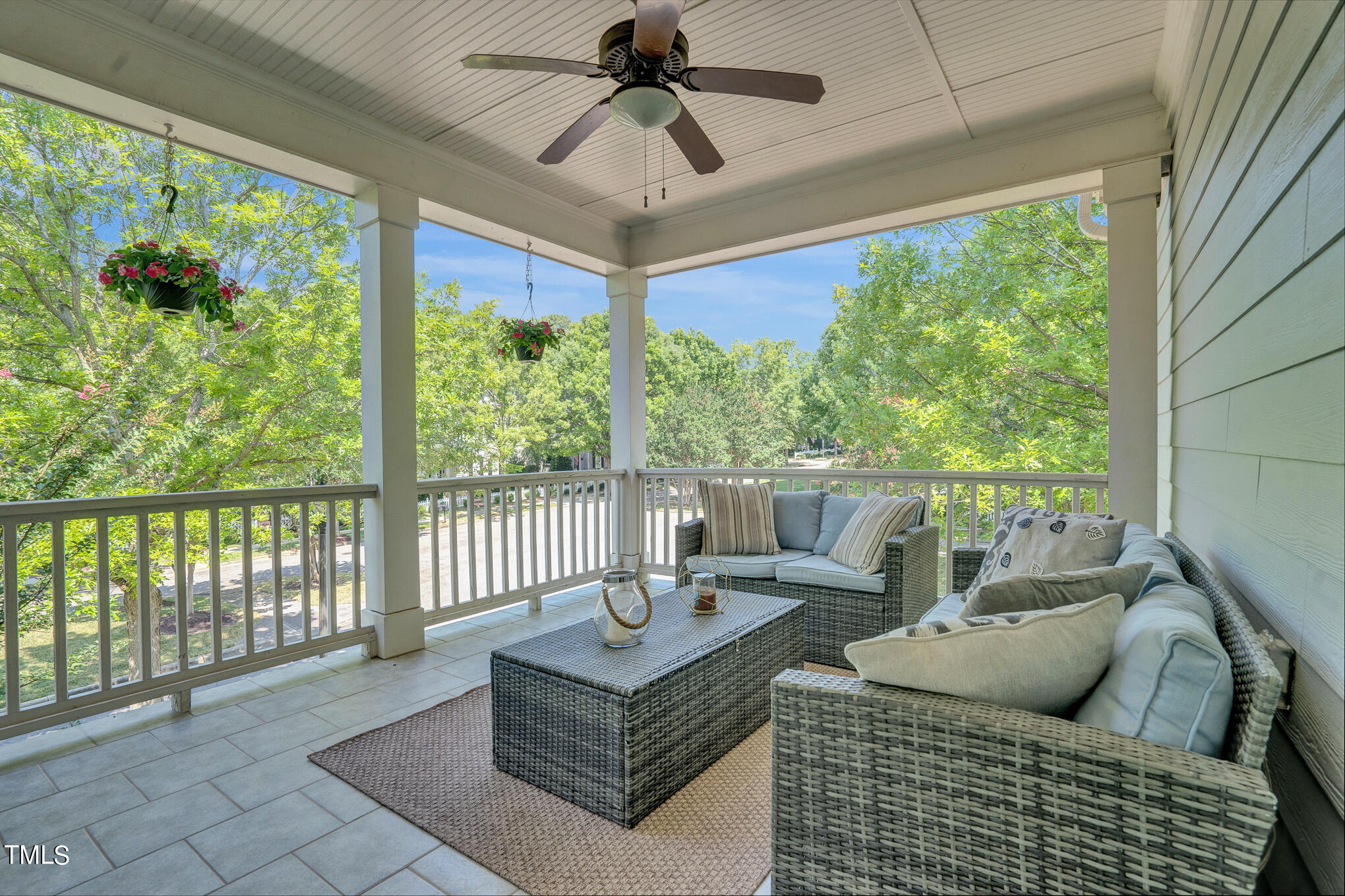 1700 Rainbow Hill Raleigh, NC 27614 - Photo 26 of 35 a living room with furniture and a floor to ceiling window