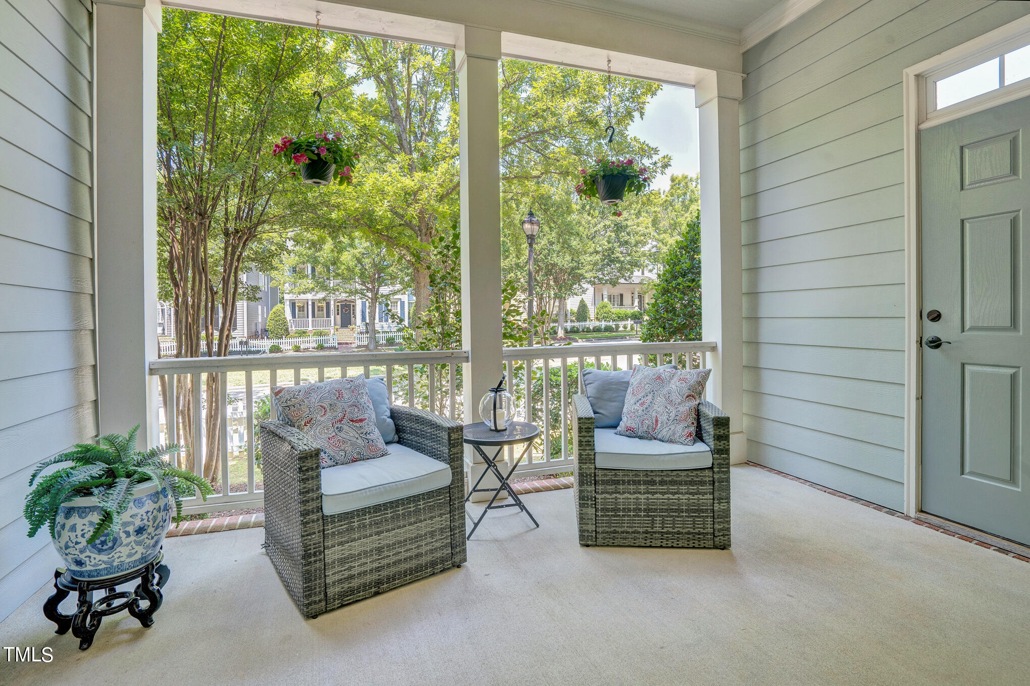 1700 Rainbow Hill Raleigh, NC 27614 - Photo 3 of 35 a living room with furniture and a potted plant