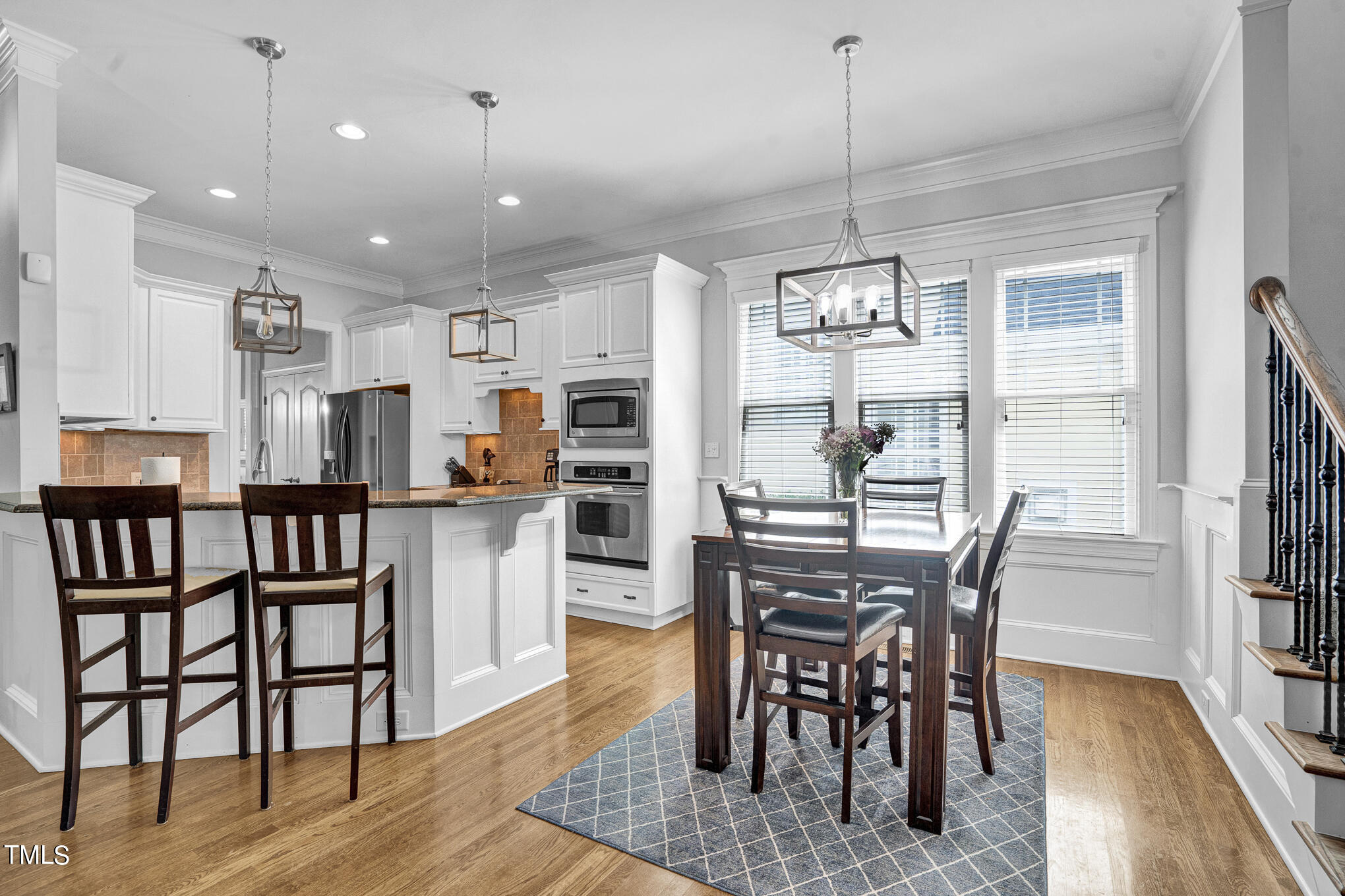 1700 Rainbow Hill Raleigh, NC 27614 - Photo 9 of 35 a view of a dining room with furniture window and wooden floor