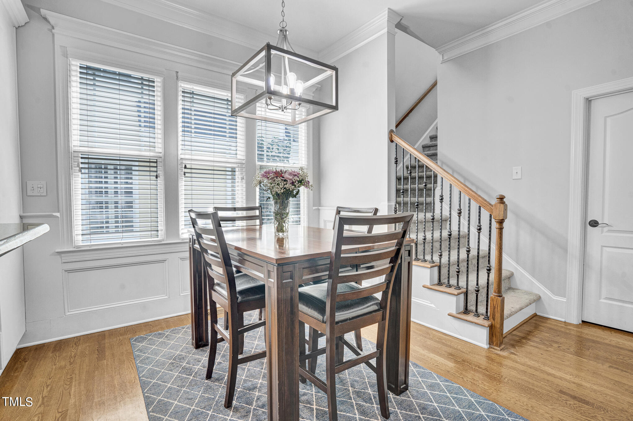 1700 Rainbow Hill Raleigh, NC 27614 - Photo 10 of 35 a view of a dining room with furniture wooden floor and chandelier