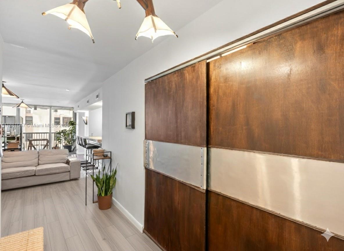 2655 Collins Avenue, Unit 510 Miami Beach, FL 33140 - Photo 23 of 23 a very nice looking room with a large window