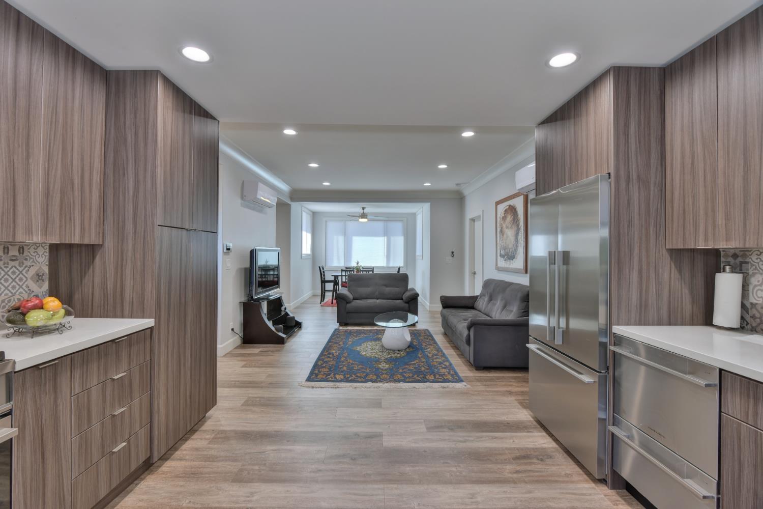 251 Middlefield Road Palo Alto, CA 94301 - Photo 12 of 76 a large kitchen with stainless steel appliances