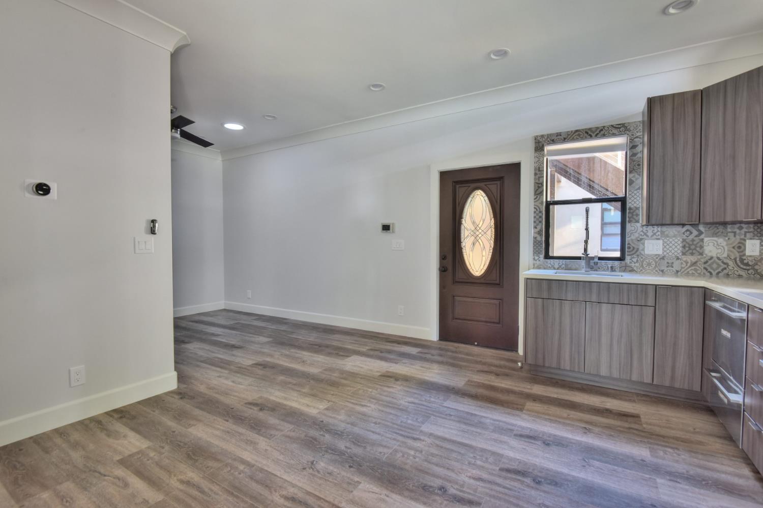 251 Middlefield Road Palo Alto, CA 94301 - Photo 27 of 76 a view of a room with wooden floor and window