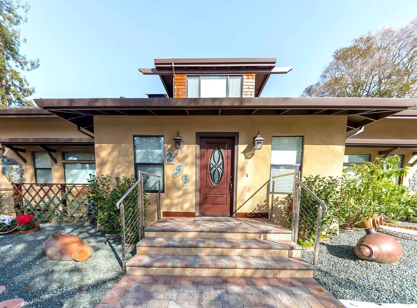 251 Middlefield Road Palo Alto, CA 94301 - Photo 3 of 76 a view of a house with potted plants and a chair