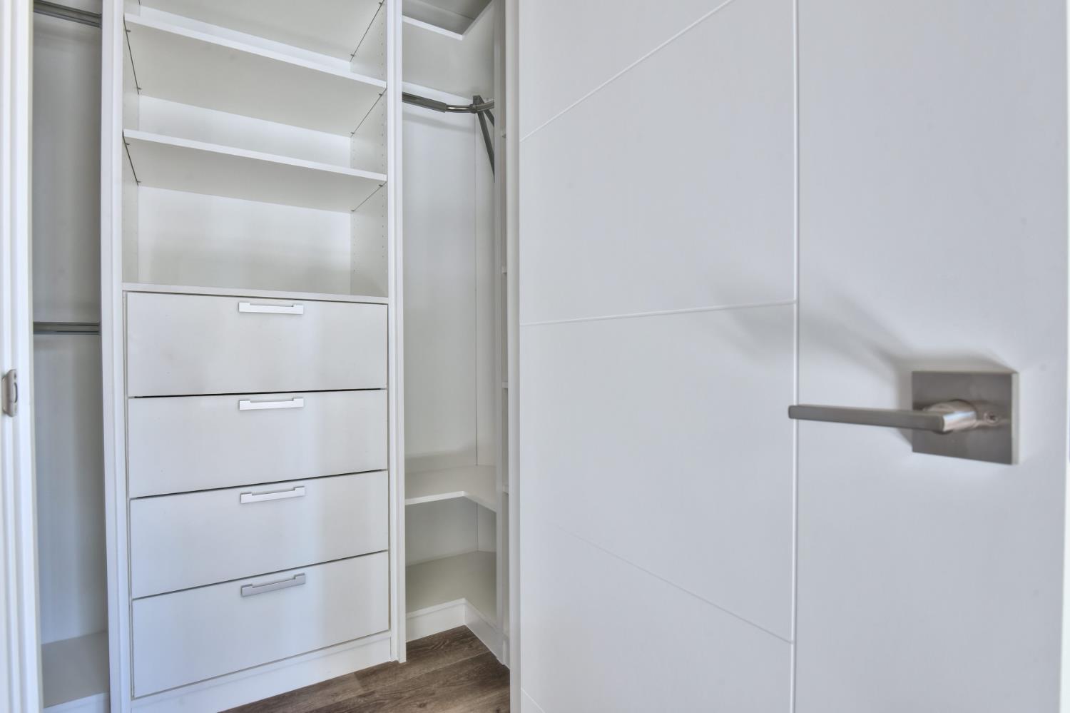 251 Middlefield Road Palo Alto, CA 94301 - Photo 33 of 76 a view of walk in closet with empty racks