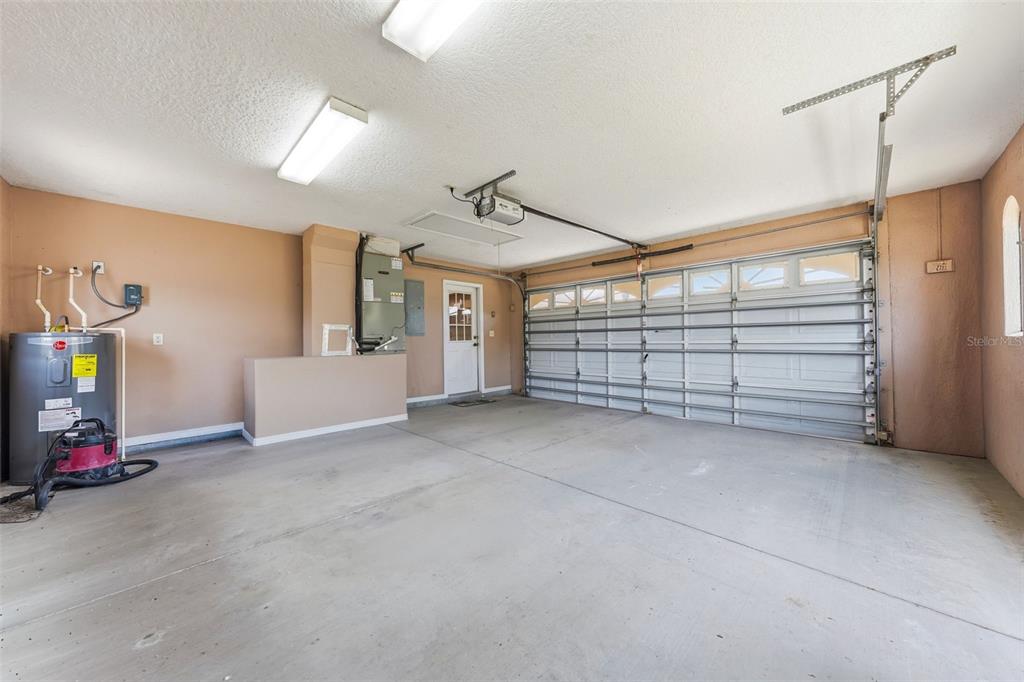 14433 Lake Yale Road Umatilla, FL 32784 - Photo 25 of 38 a view of a garage with storage