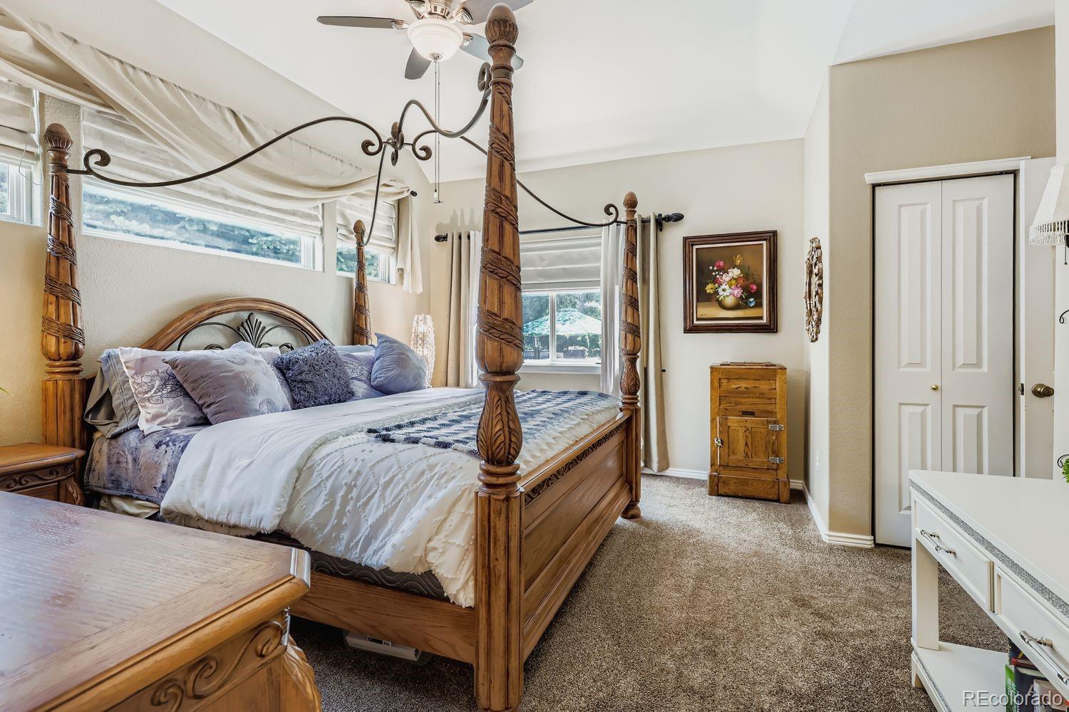 10752 Zuni Drive Denver, CO 80234 - Photo 14 of 27 a bedroom with furniture and a window