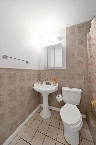 a bed room with a bed and a couch