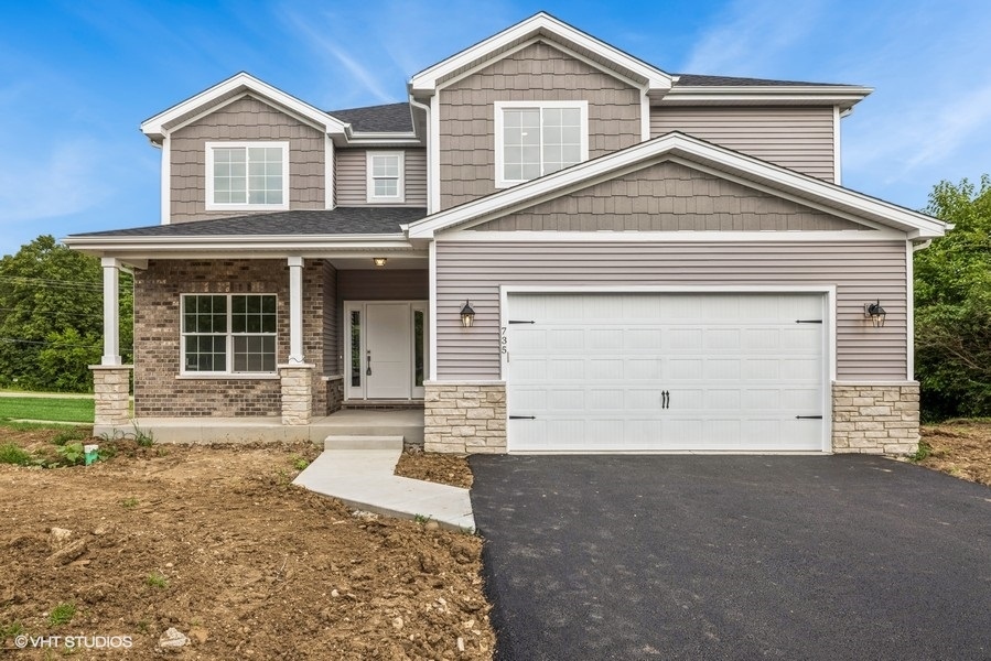 a house view with a outdoor space