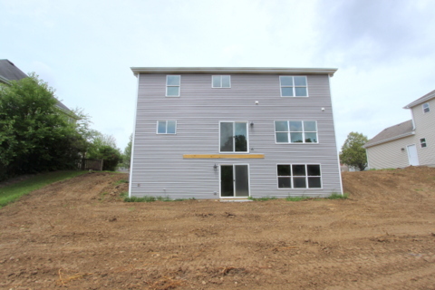 735 Fox Trail Terrace Cary, IL 60013 - Photo 18 of 21 a front view of a house with a yard
