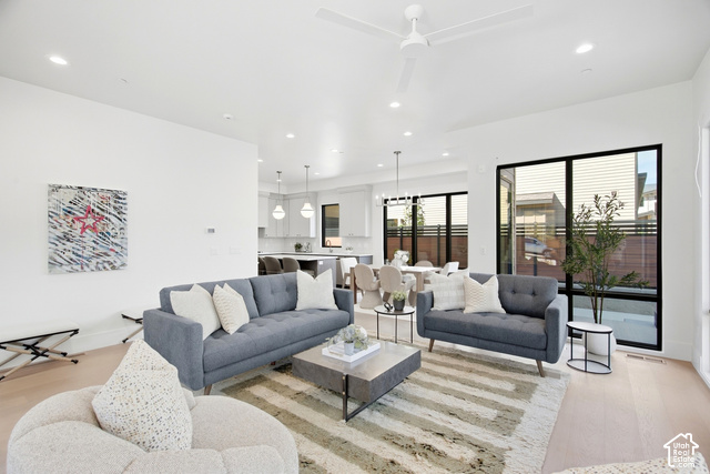 4092 Discovery Way Park City, UT 84098 - Photo 19 of 66 Open-concept living area with light wood-finish flooring, recessed lighting, and a contemporary ceiling fan
