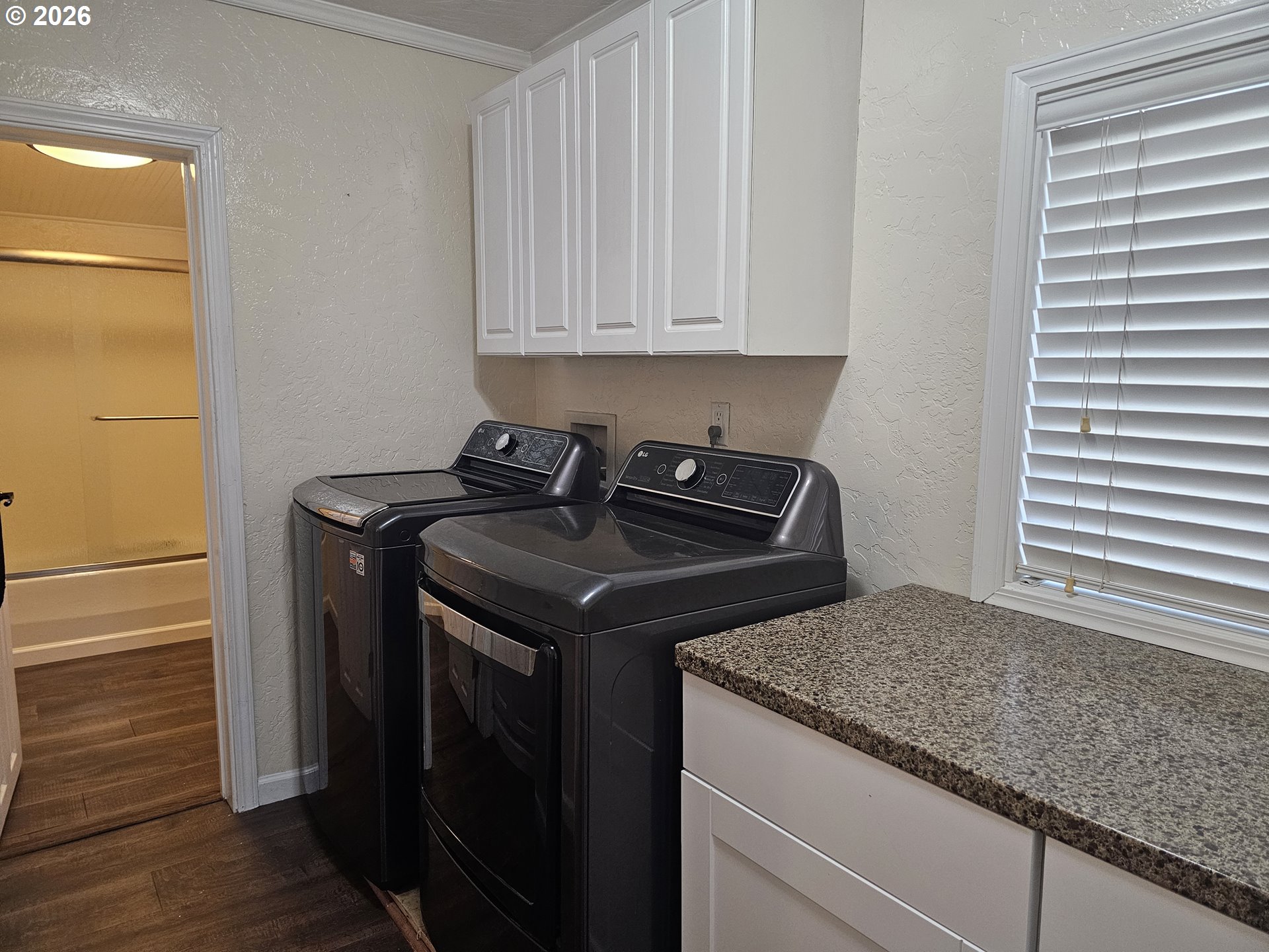 237 Wharf Street Brookings, OR 97415 - Photo 12 of 27 a kitchen with a sink and cabinets