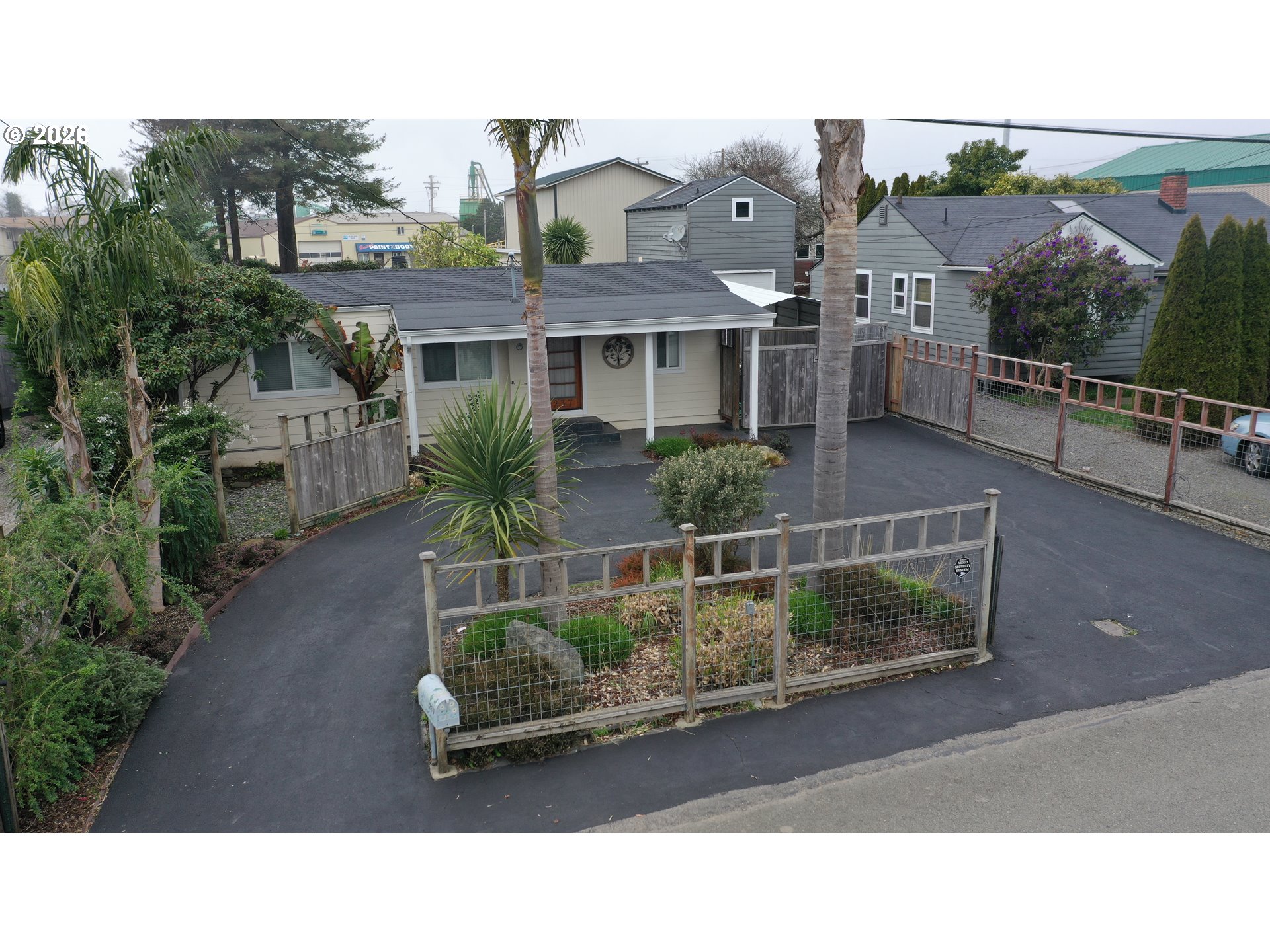 237 Wharf Street Brookings, OR 97415 - Photo 25 of 27 a aerial view of a house with a yard