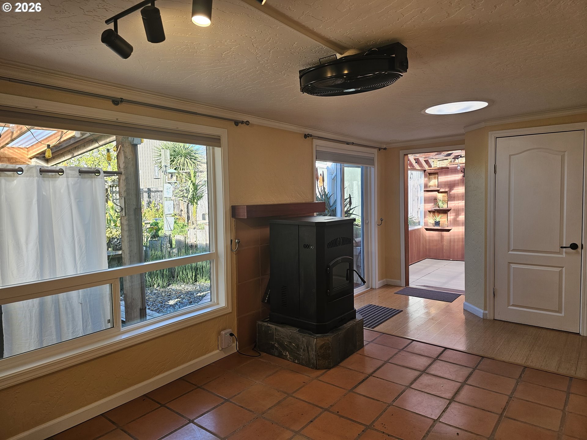 237 Wharf Street Brookings, OR 97415 - Photo 7 of 27 a view of a hallway with furniture and windows
