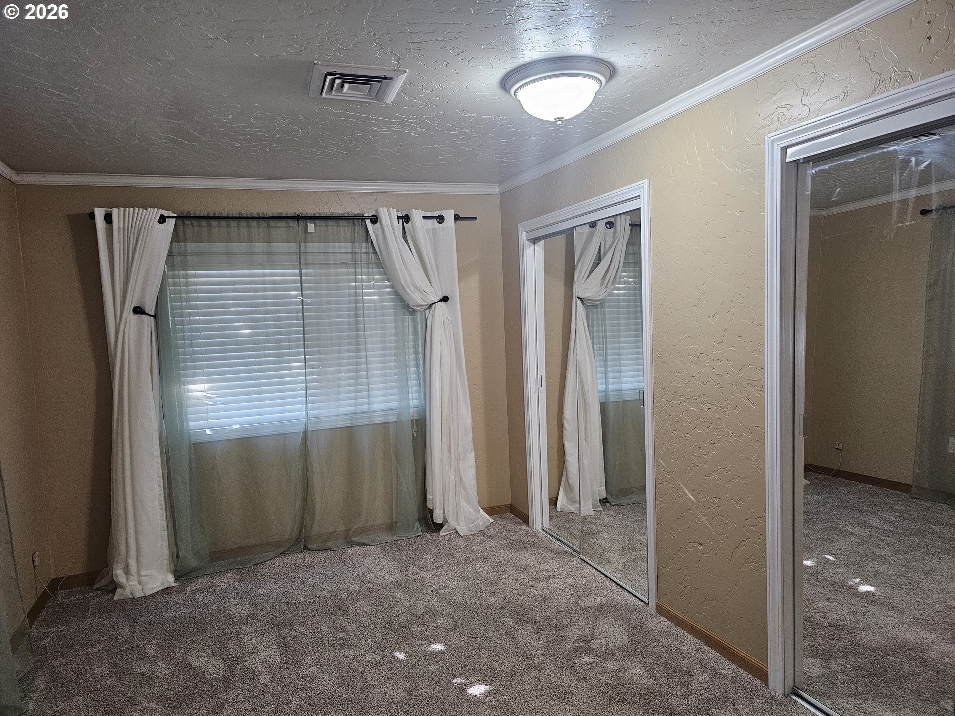 237 Wharf Street Brookings, OR 97415 - Photo 9 of 27 an empty room with closet