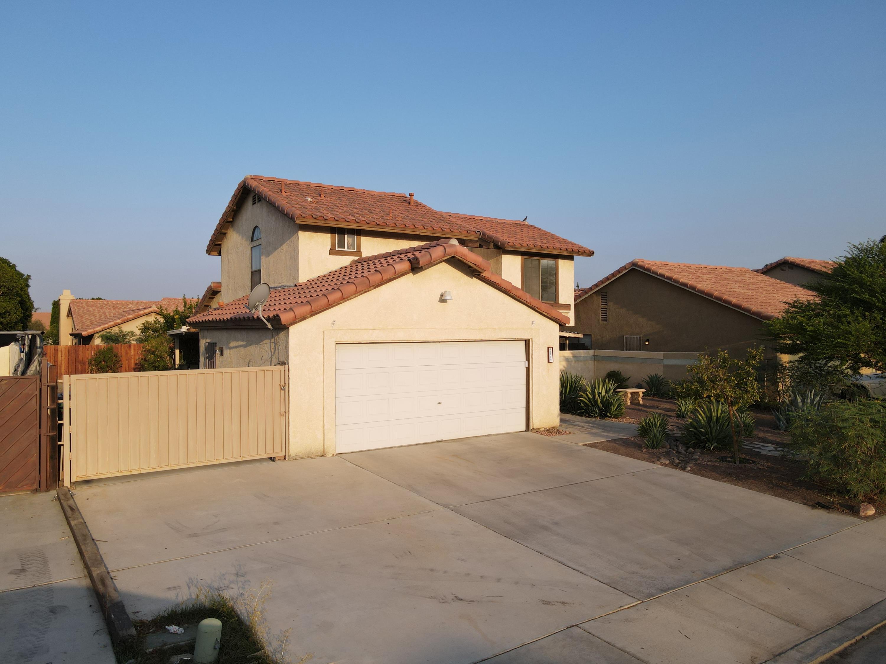 45808 Sutter Creek Road Indio, CA 92201 - Photo 1 of 55 a view of a house with a yard