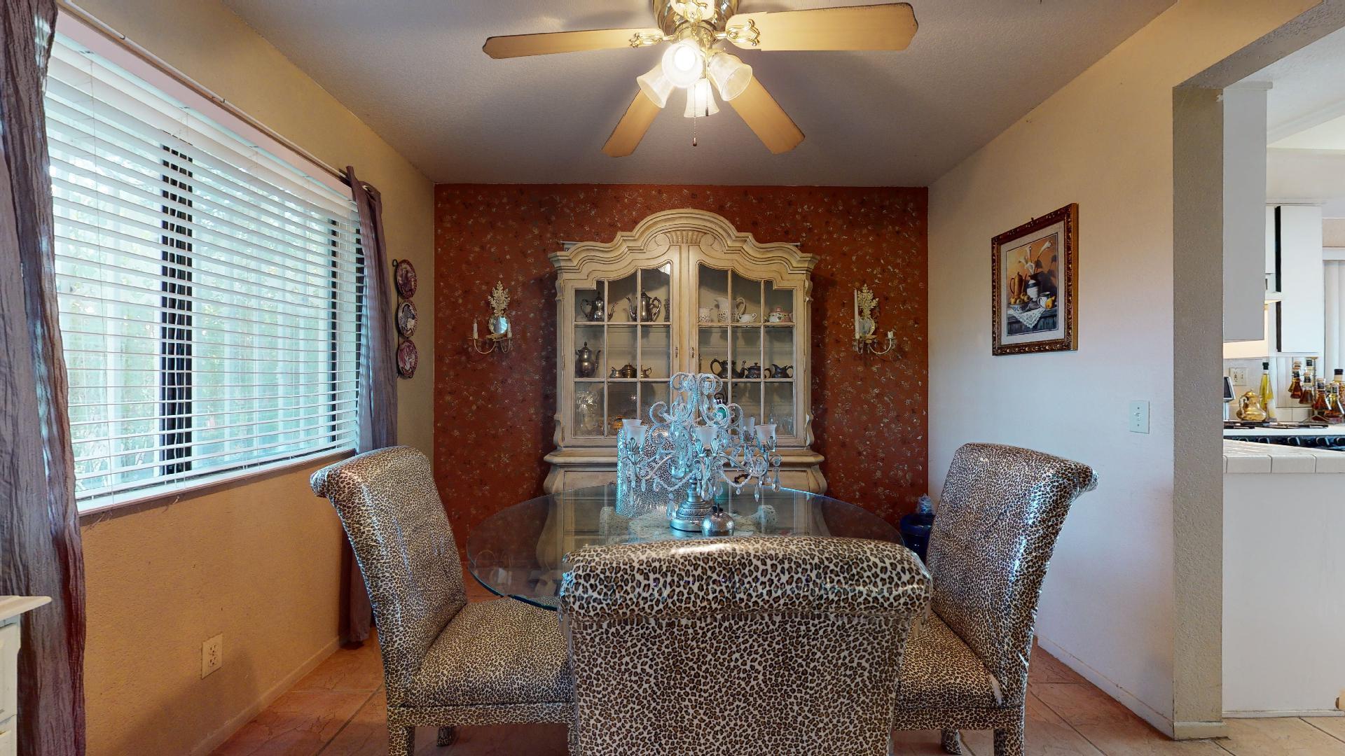45808 Sutter Creek Road Indio, CA 92201 - Photo 11 of 55 a dining room with furniture and window
