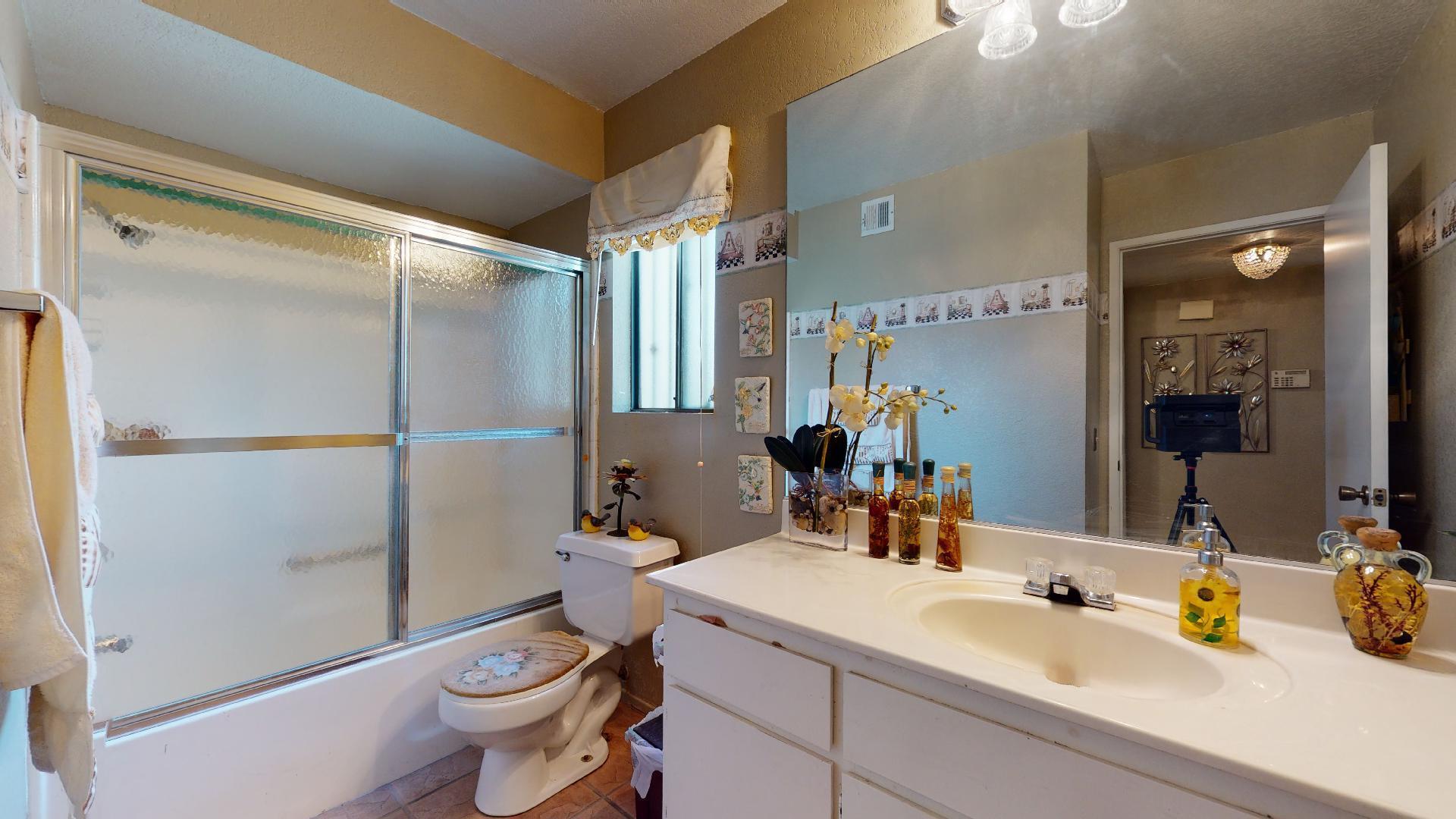 45808 Sutter Creek Road Indio, CA 92201 - Photo 18 of 55 a bathroom with a sink toilet and shower