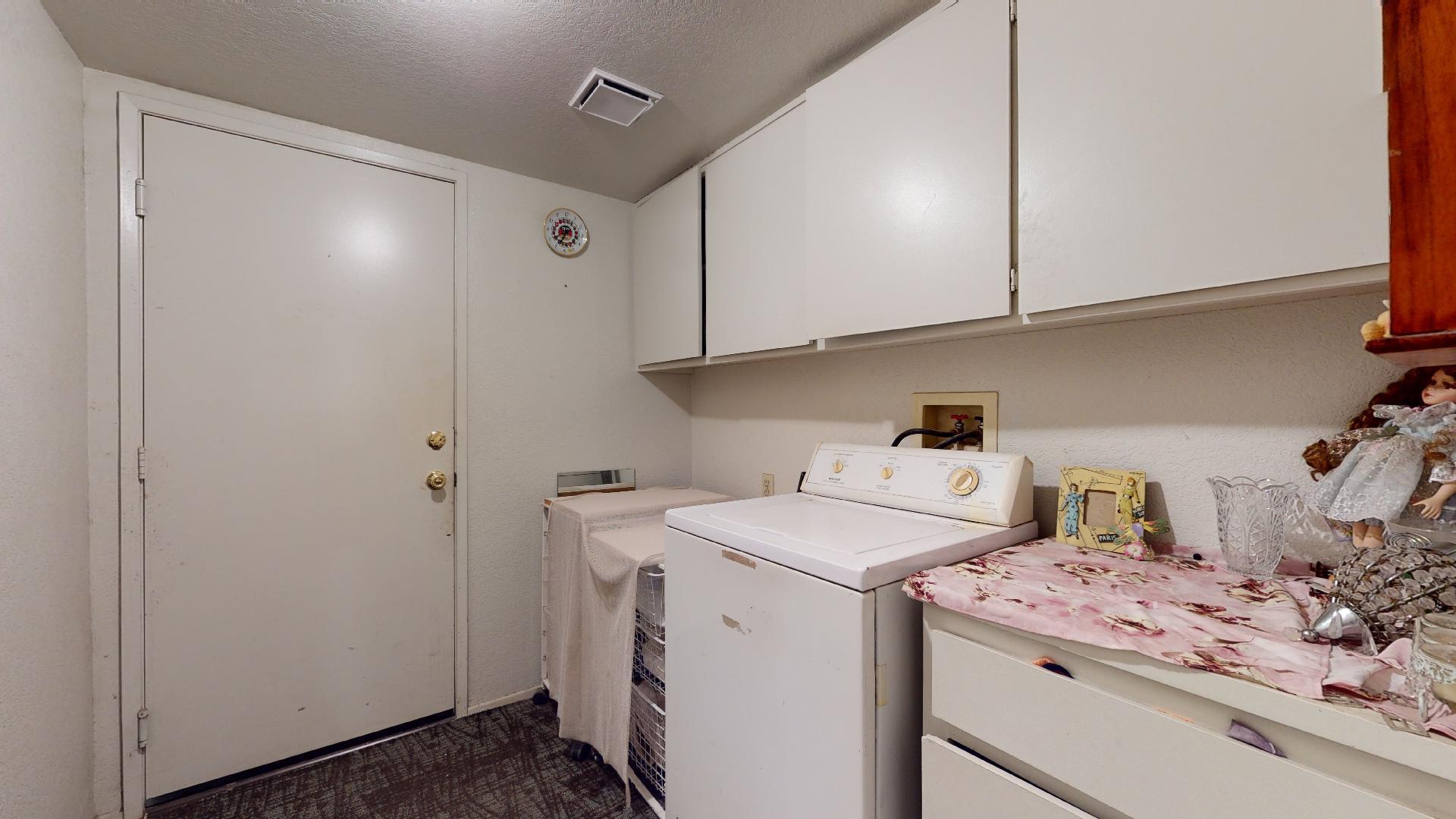45808 Sutter Creek Road Indio, CA 92201 - Photo 20 of 55 a utility room with dryer and washer