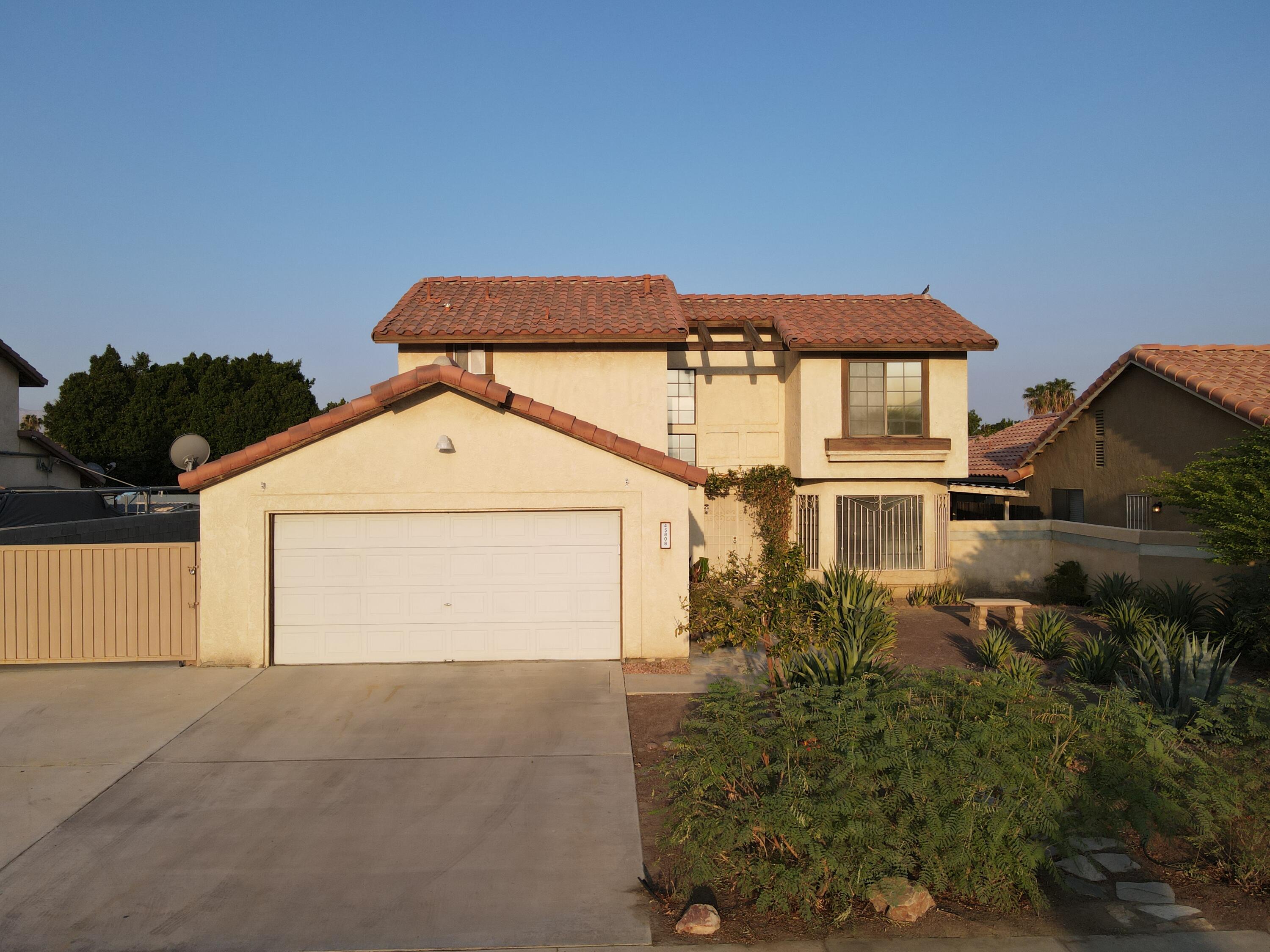 45808 Sutter Creek Road Indio, CA 92201 - Photo 3 of 55 a view of a house with a yard