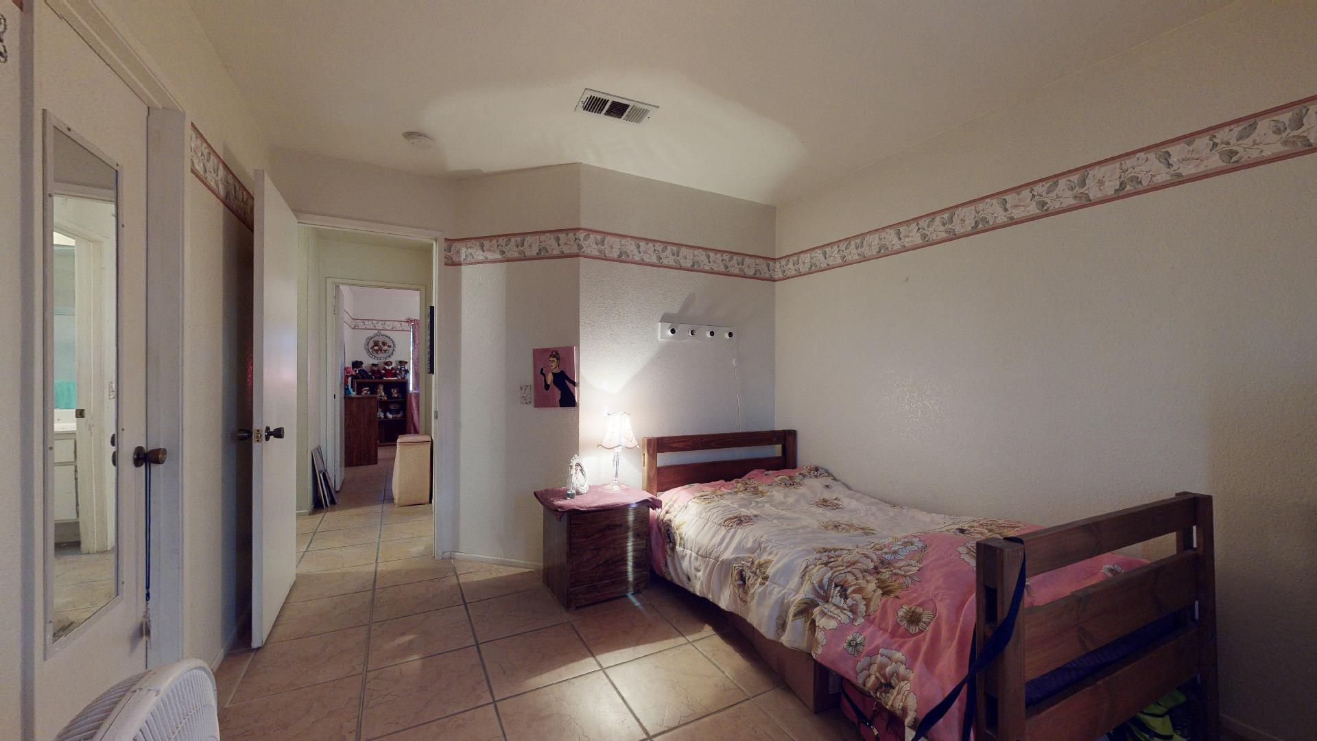 45808 Sutter Creek Road Indio, CA 92201 - Photo 29 of 55 a bedroom with a bed and a shower