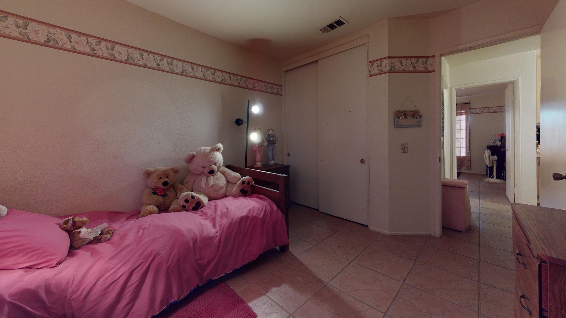 45808 Sutter Creek Road Indio, CA 92201 - Photo 38 of 55 a bed room with a bed and a closet