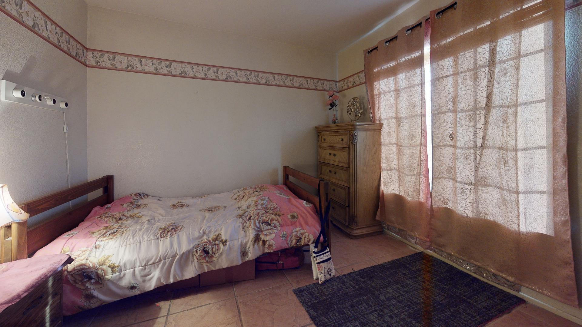 45808 Sutter Creek Road Indio, CA 92201 - Photo 41 of 55 a bedroom with a bed a window and shower