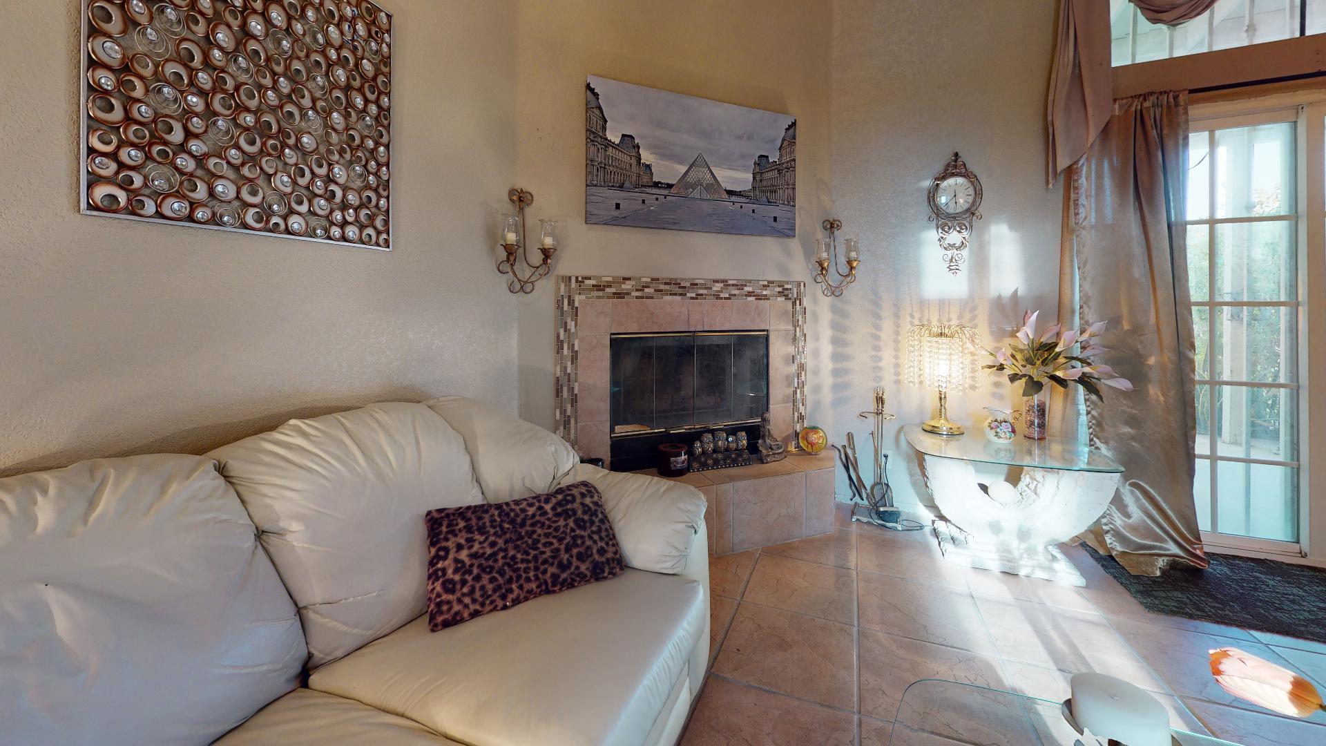 45808 Sutter Creek Road Indio, CA 92201 - Photo 47 of 55 a living room with furniture and a fireplace
