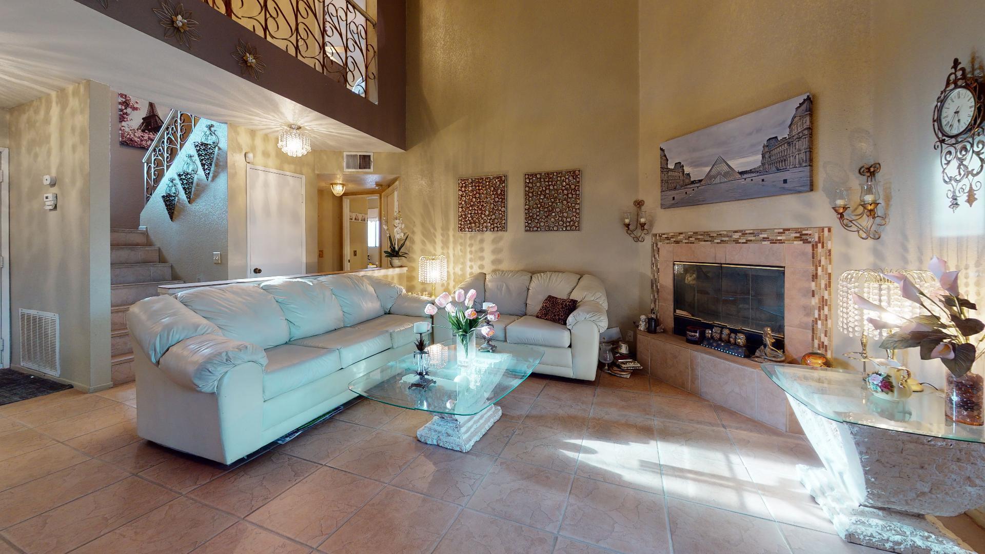 45808 Sutter Creek Road Indio, CA 92201 - Photo 48 of 55 a living room with furniture and a fireplace