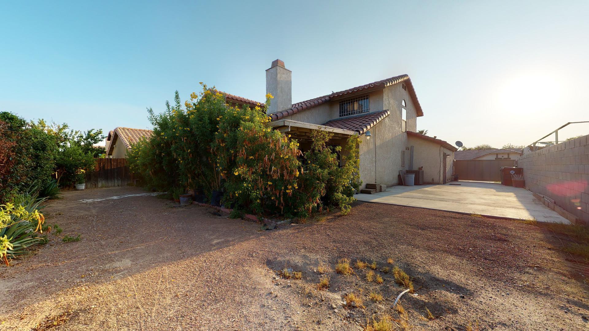 45808 Sutter Creek Road Indio, CA 92201 - Photo 51 of 55 a view of a house with a yard