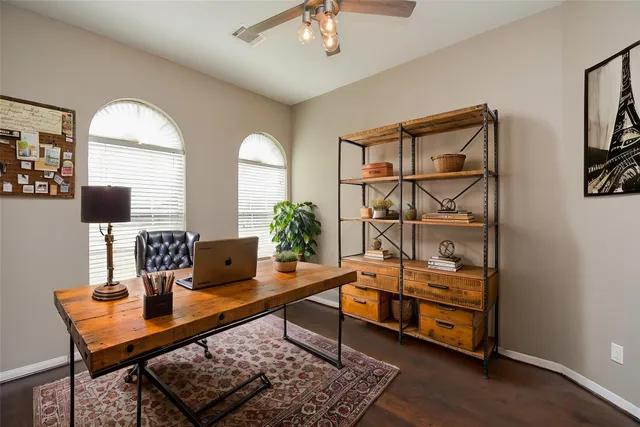 a living room with furniture and decor