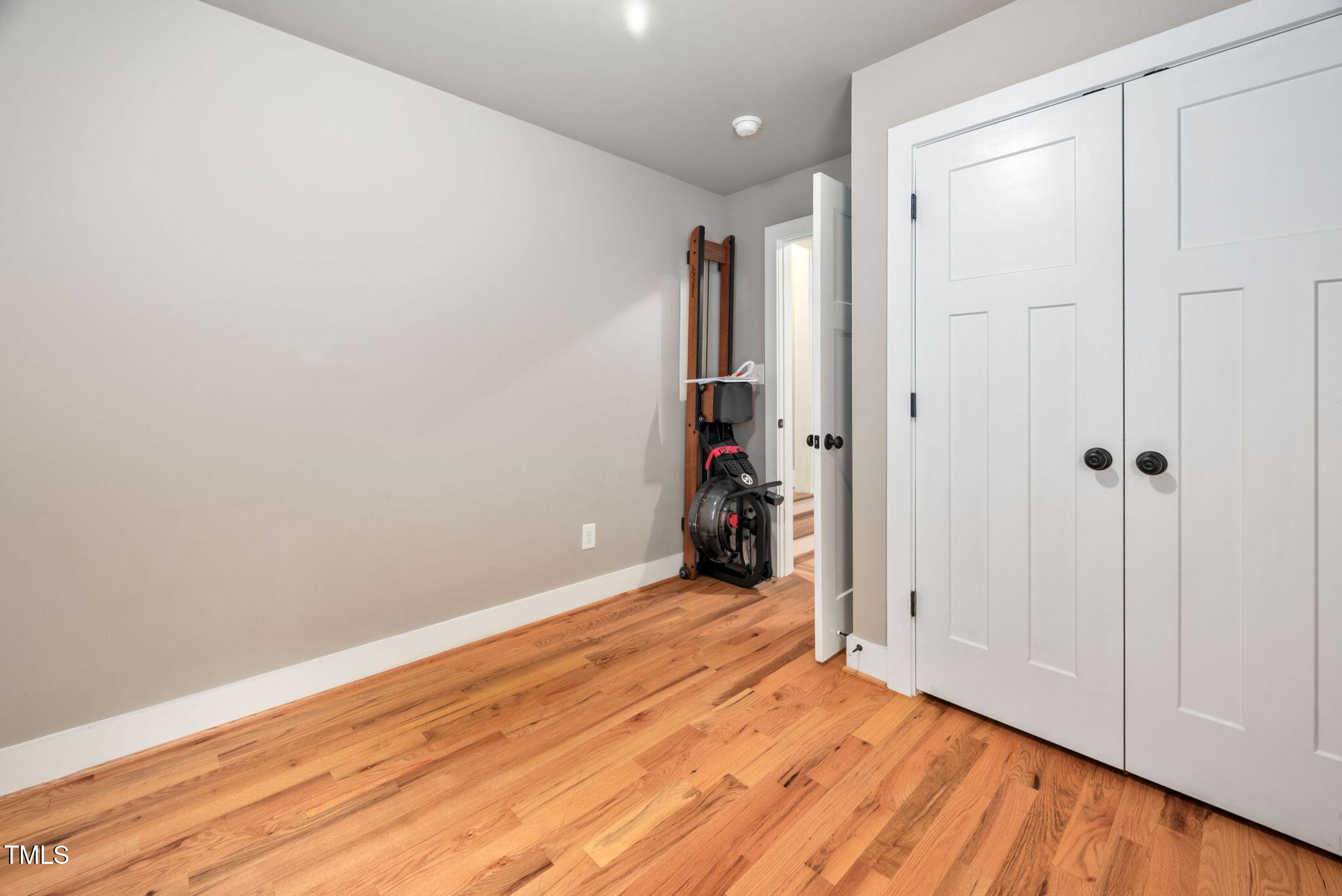325 Martin Luther King Jr Boulevard Raleigh, NC 27601 - Photo 19 of 32 a view of a room with wooden floor and a bathroom