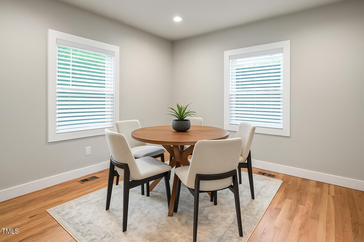 325 Martin Luther King Jr Boulevard Raleigh, NC 27601 - Photo 10 of 32 a view of a dining room with furniture window and wooden floor