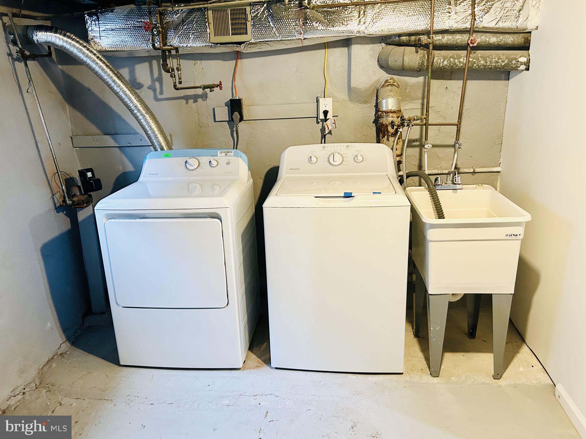 2013 South Bouvier Street Philadelphia, PA 19145 - Photo 16 of 18 a utility room with dryer and washer