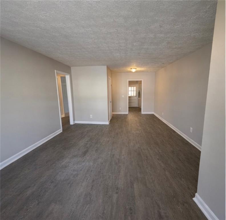 846 Wilson Circle Southwest Marietta, GA 30064 - Photo 3 of 6 a view of empty room with wooden floor