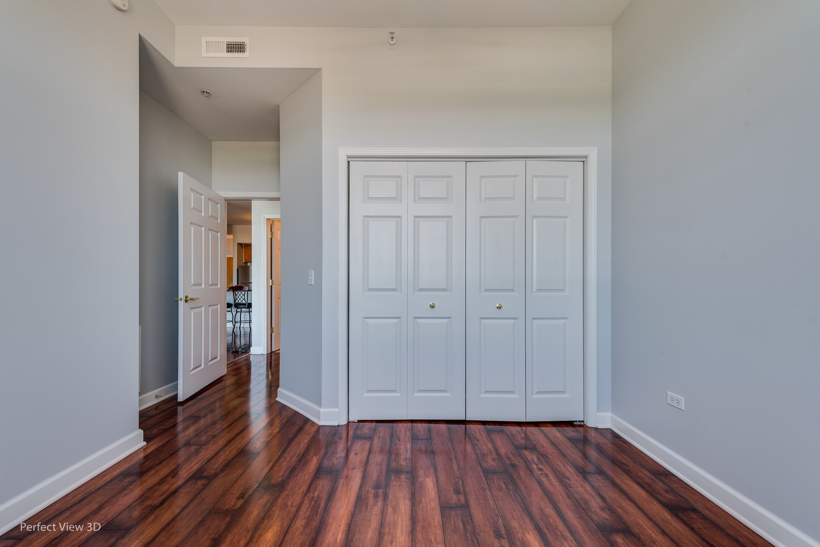 77 North Wolf Road, Unit 601 Northlake, IL 60164 - Photo 12 of 19 a view of a hallway with wooden floor