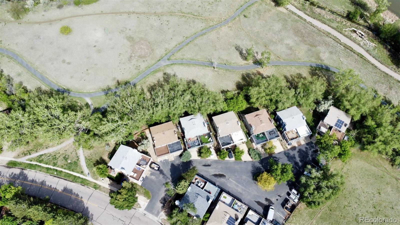 4645 Portside Way Boulder, CO 80301 - Photo 22 of 22 an aerial view of a house with a yard and garden